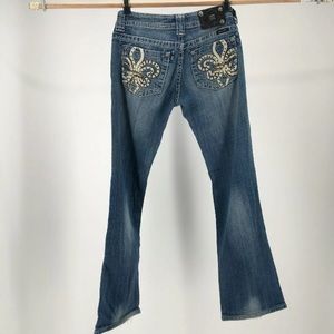 Miss Me size 29 jeans. Bootcut embellished. Trefoil pocket.